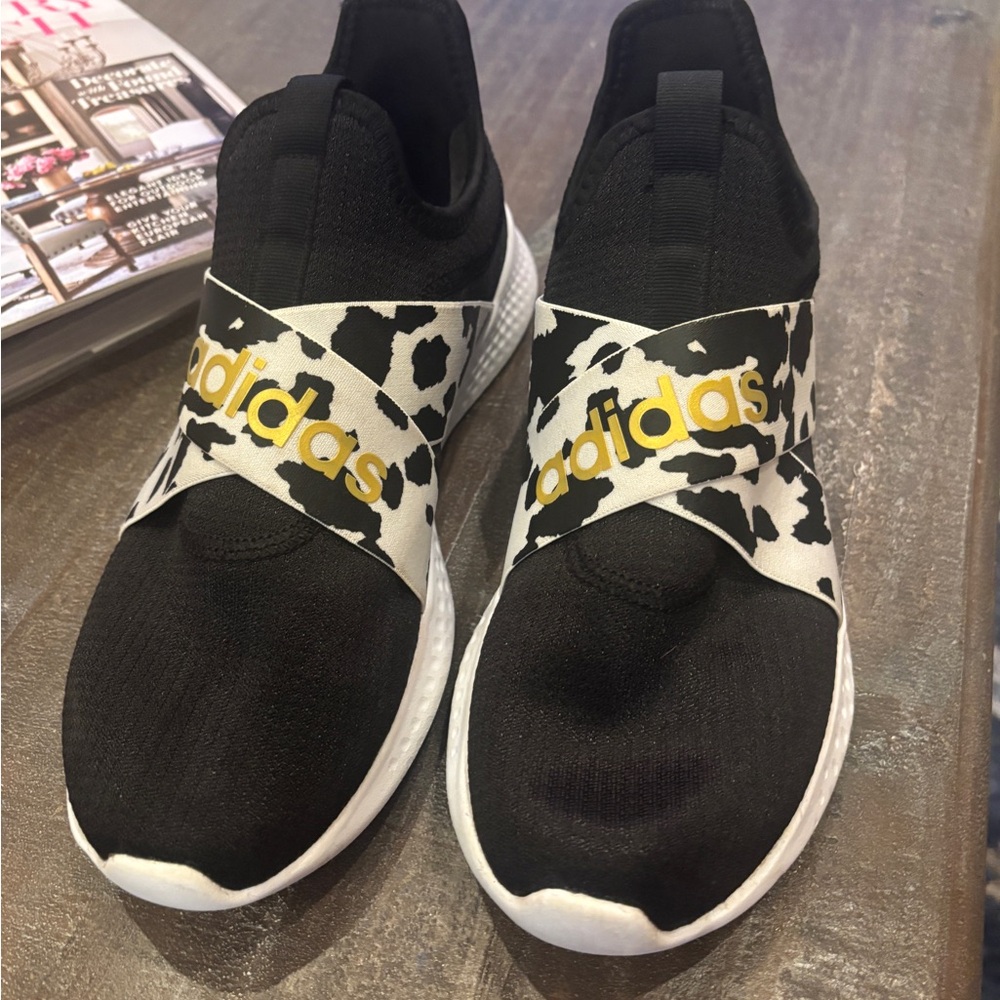 Adidas Black and White Slip-On Shoes with Gold Accents